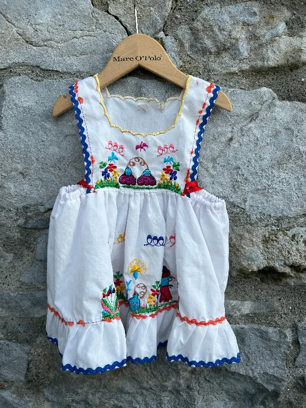 Folk embroidered white pinafore  0-6m (56-68cm)